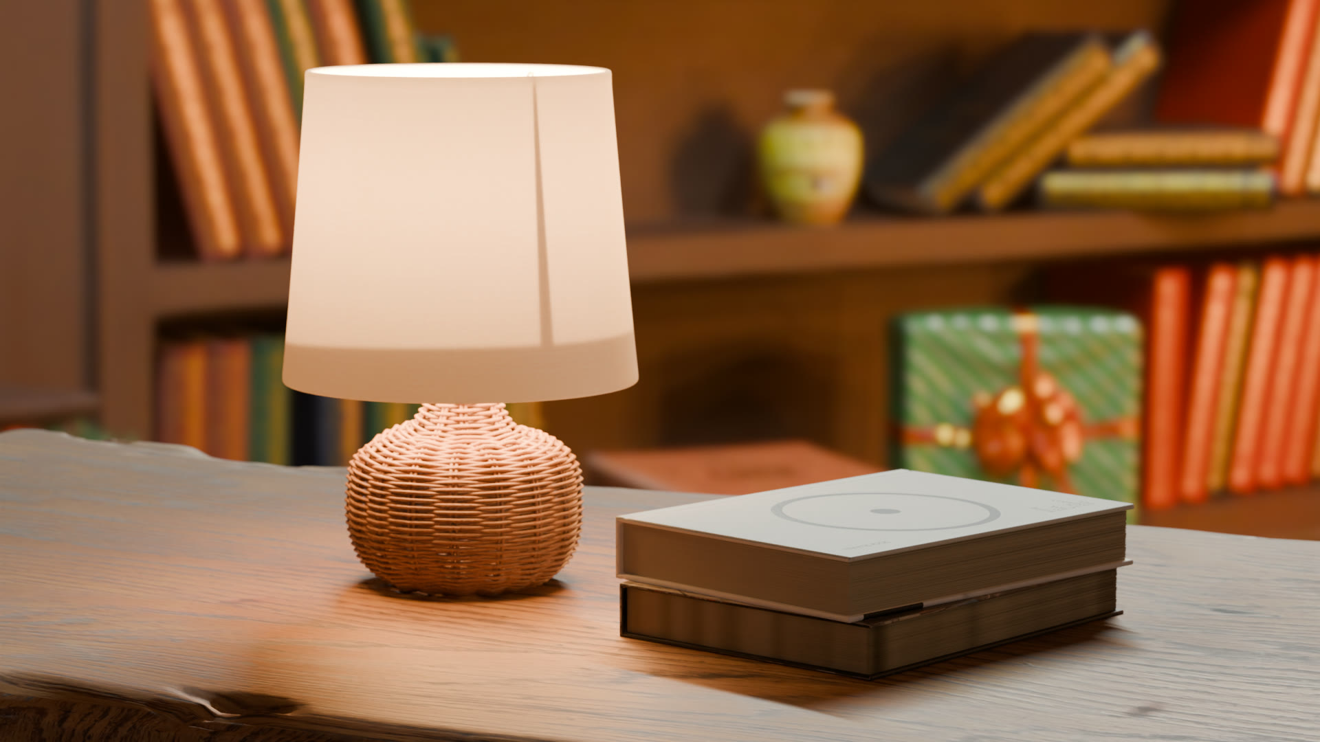 A boxed hardcover on a wooden desk beside the lamp